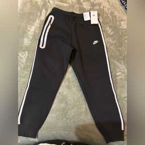 Reflective Nike tech pants